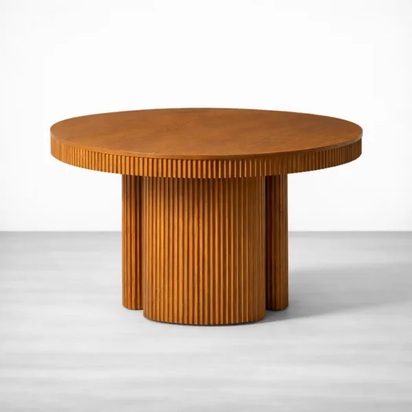 Front view of round fluted teakwood dining table by INTERIORZE