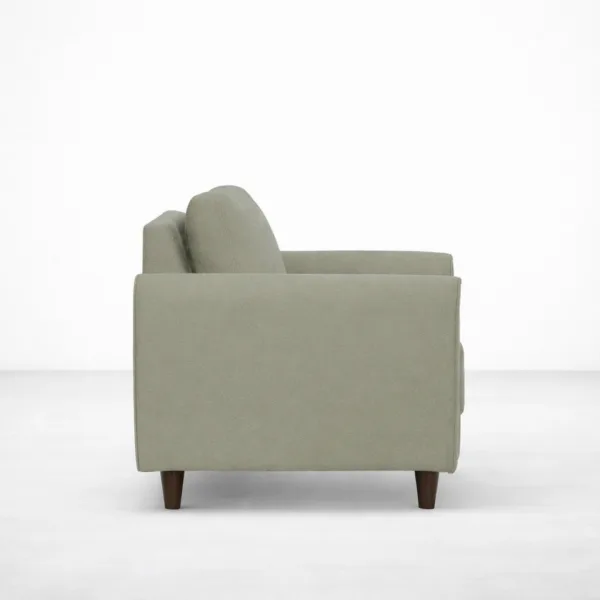 Sage green armchair with teakwood legs side view, INTERIORZE ELM.