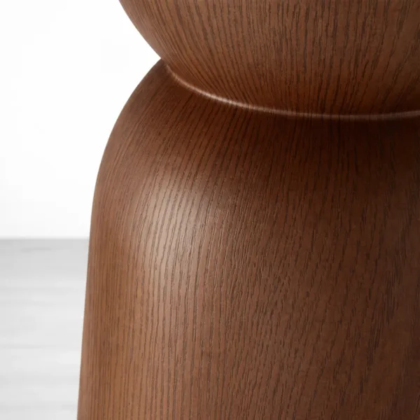 Solid teakwood sculpted pedestal base detail of Elara oval dining table