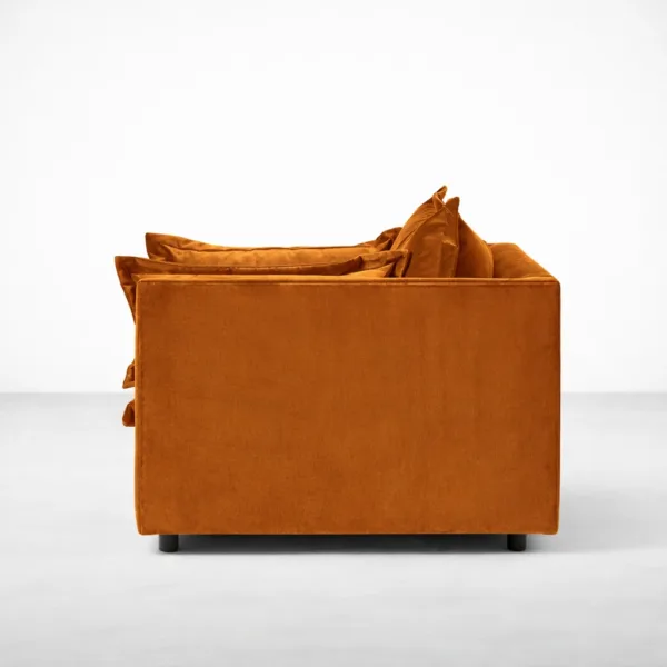 Burnt orange velvet lounge chair side profile with deep seat, INTERIORZE ARLO