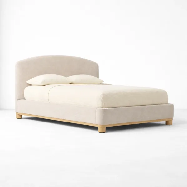 Upholstered teakwood bed with arched headboard in beige fabric and teak base by INTERIORZE