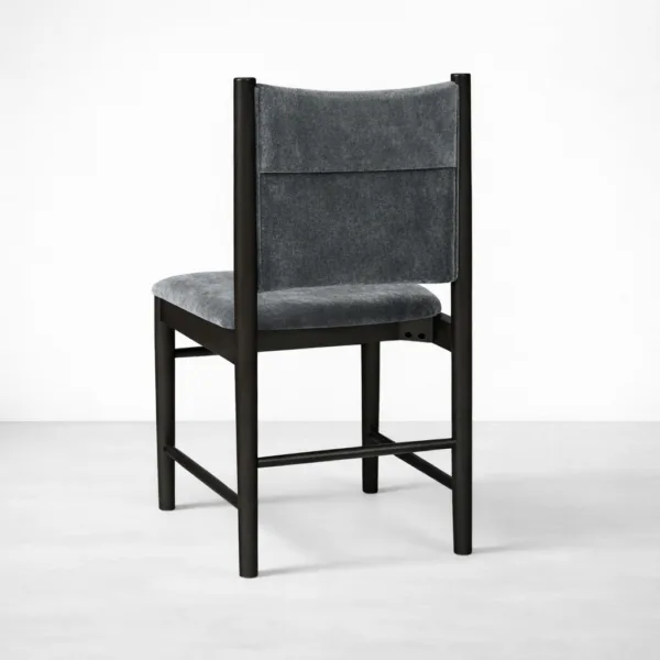 Slate grey upholstered dining chair with teakwood frame back view INTERIORZE Noir