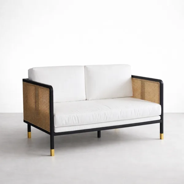 Teak cane 2 seater sofa in matte black frame with ivory cushions by INTERIORZE