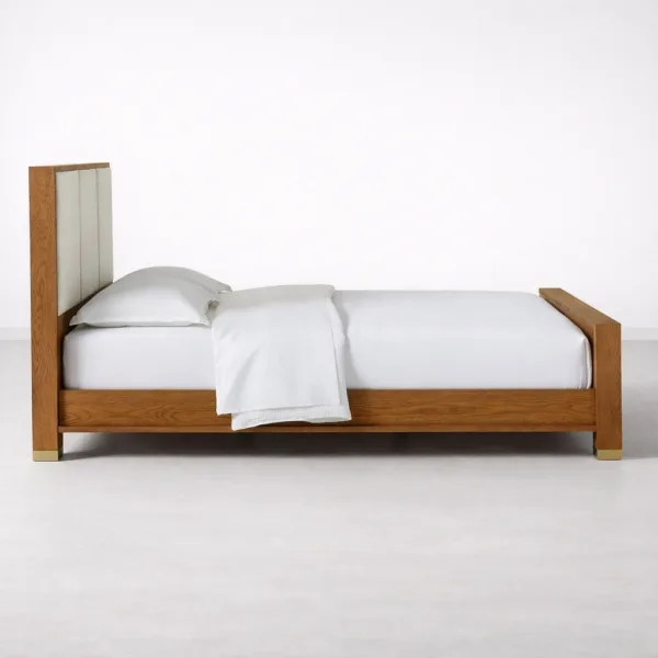 Side view of INTERIORZE Elora teakwood upholstered panel bed with tall upholstered headboard