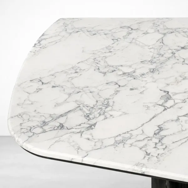 White marble surface with grey veining on Noira dining table top