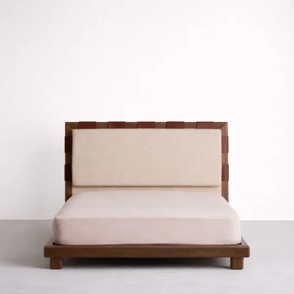Teakwood upholstered bed with leather strap headboard detail front view