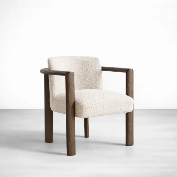 Boucle armchair teakwood frame ivory upholstery angled view