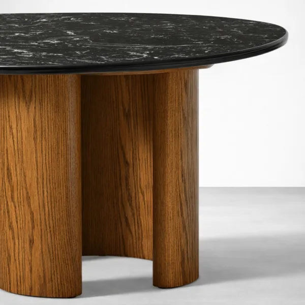 Black marble tabletop edge detail on Obsidia round dining table