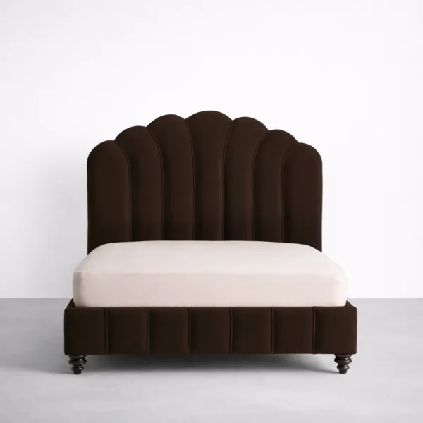 Brown upholstered bed with scallop panel headboard front view