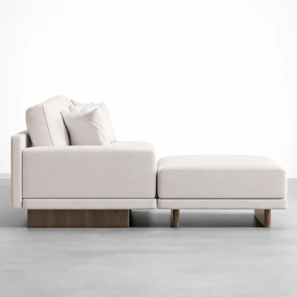 Side profile of teakwood console L shape sectional sofa ivory upholstery INTERIORZE