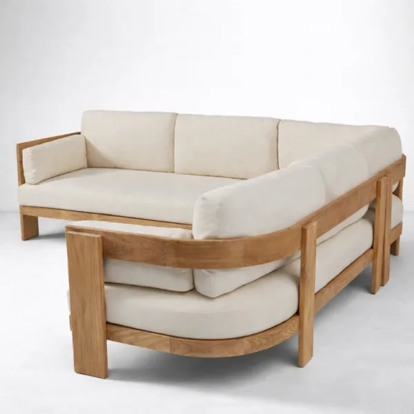 Back view of teakwood L shape sectional sofa showing solid teak frame and cushions