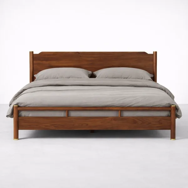 Solid teakwood bed frame by INTERIORZE with rounded posts and brass leg accents
