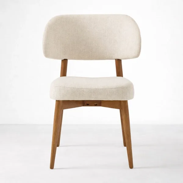 Beige upholstered dining chair front view with cushioned seat and back