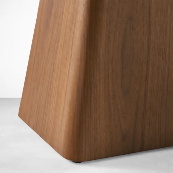 Teakwood pedestal base detail of Nivora solid teakwood oval dining table