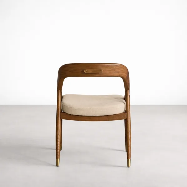 INTERIORZE Elara teakwood dining chair back view with brass detail