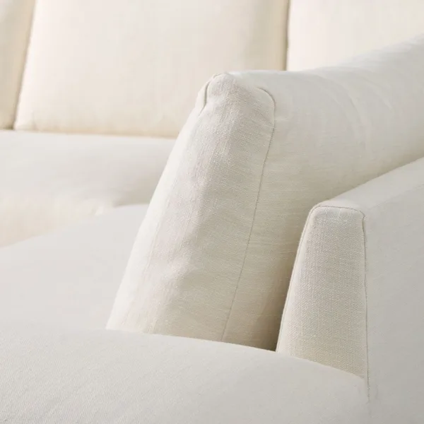 Ivory linen sectional sofa close detail showing clean stitching by INTERIORZE
