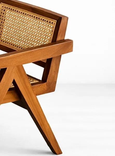INTERIORZE Kairo teakwood cane arm chair with natural cane back and seat in warm honey finish