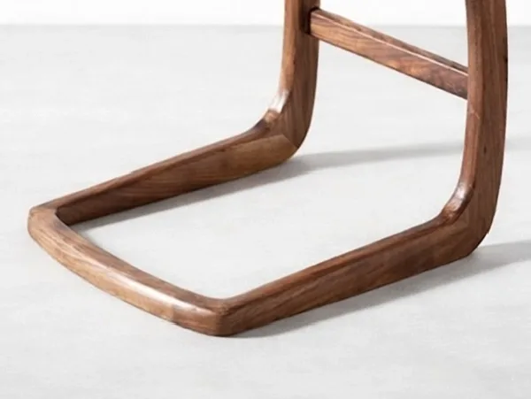 Handcrafted teakwood side table with rounded square top and cantilever base by INTERIORZE