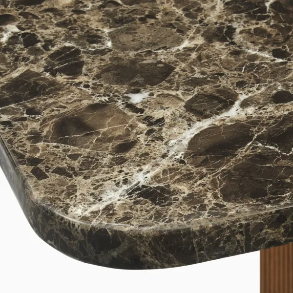 Close-up of dark marble tabletop with natural veining on INTERIORZE Verona dining table