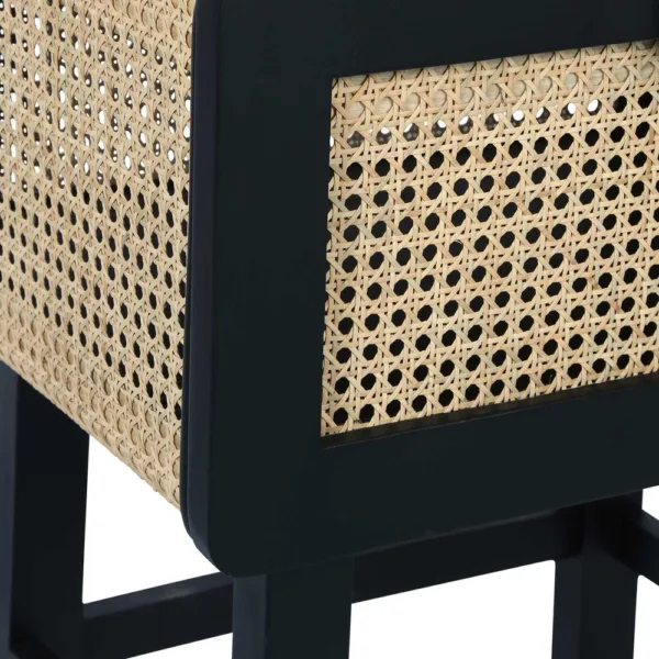 close up of woven cane detail on teakwood bedside table