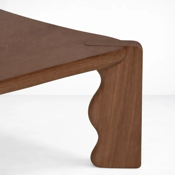 INTERIORZE Wavren sculpted teakwood centre table with artistic carved legs