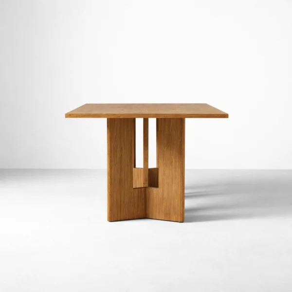 End view of INTERIORZE Varello teakwood pedestal dining table