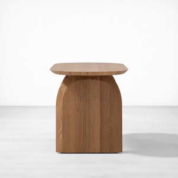 Side detail of INTERIORZE Elara Arch solid wood dining table in natural finish