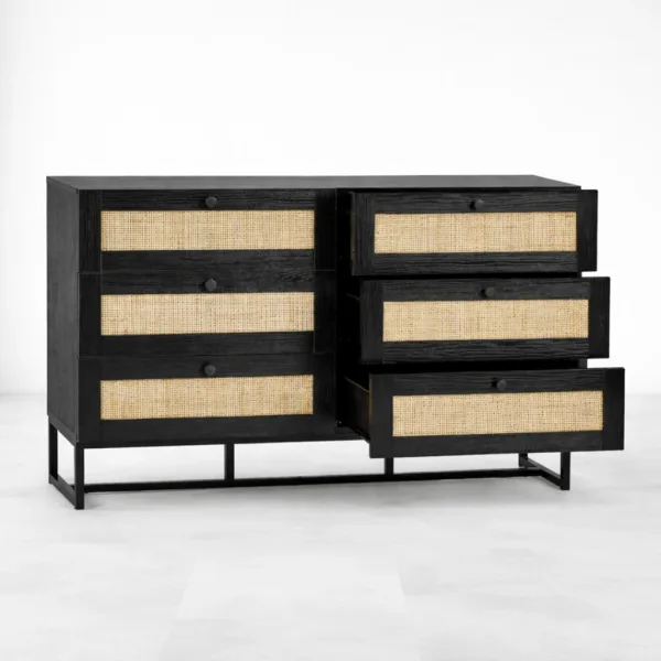 open drawer view of black teak wood cane chest of drawers