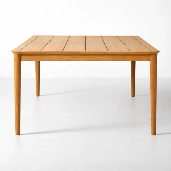 Side view of INTERIORZE Aurel solid teakwood dining table