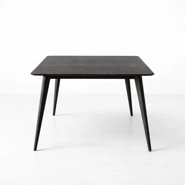 Front view of INTERIORZE Vanta Edge solid wood dining table