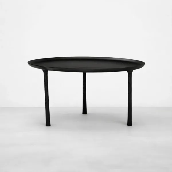 INTERIORZE teakwood round center table with slim sculptural legs in matte black finish