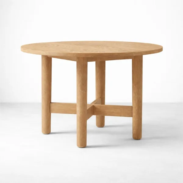 Close-up of round teakwood tabletop edge on INTERIORZE Orvyn dining table solid teakwood round dining table