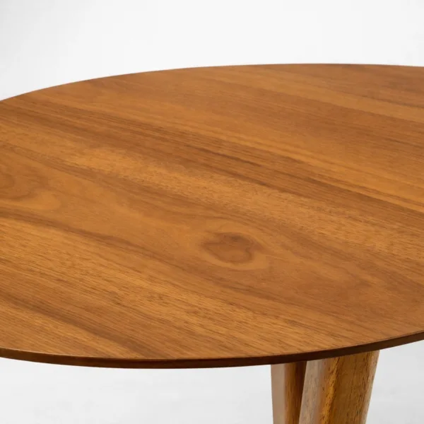 Close-up of teakwood grain on INTERIORZE Alvyn oval dining table top
