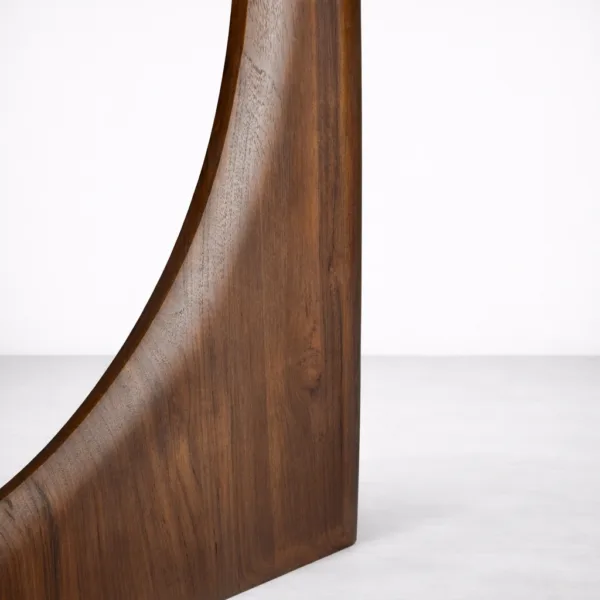 Close-up of curved wood base on INTERIORZE Arco Halo round dining table