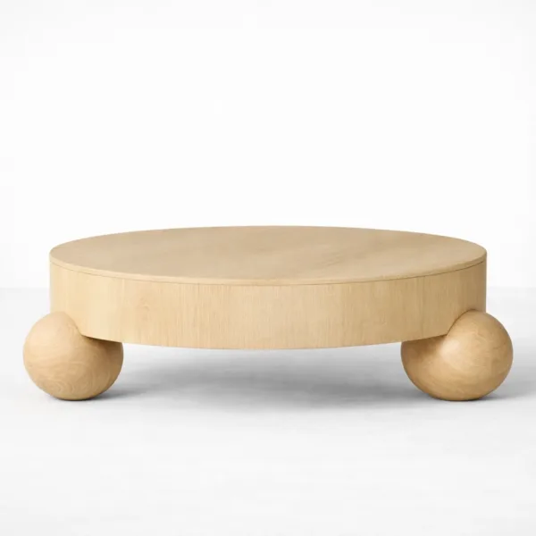 INTERIORZE ash wood coffee table with oval top and rounded orb legs in natural finish