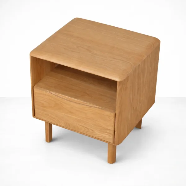 angled view of natural finish ashwood bedside table with open shelf