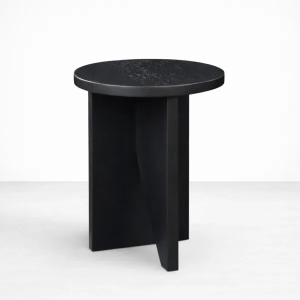 Handcrafted black teakwood side table with round top and geometric base by INTERIORZE