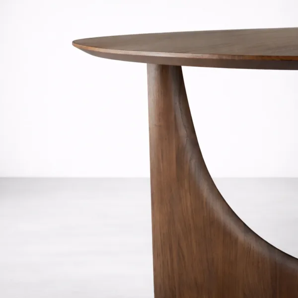 Side detail of INTERIORZE Arco Halo round dining table with curved support