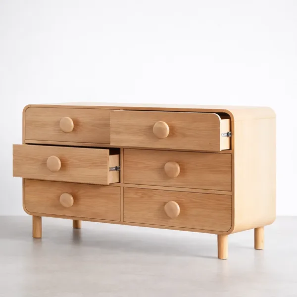 ash wood chest of drawers with open drawers and round wooden knobs