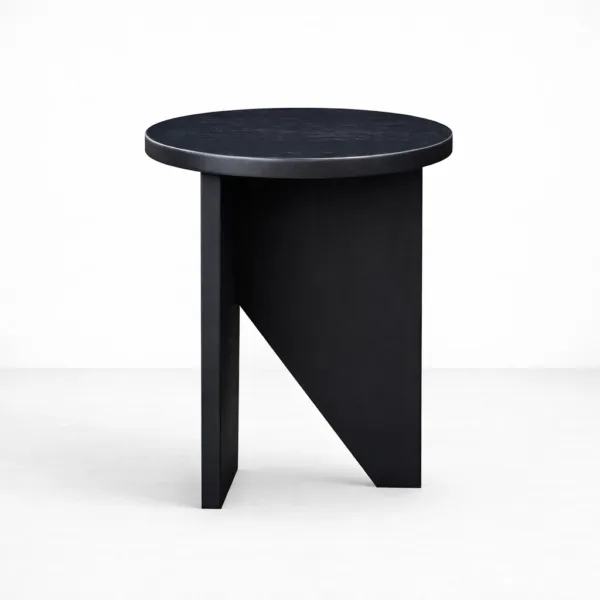 Handcrafted black teakwood side table with round top and geometric base by INTERIORZE