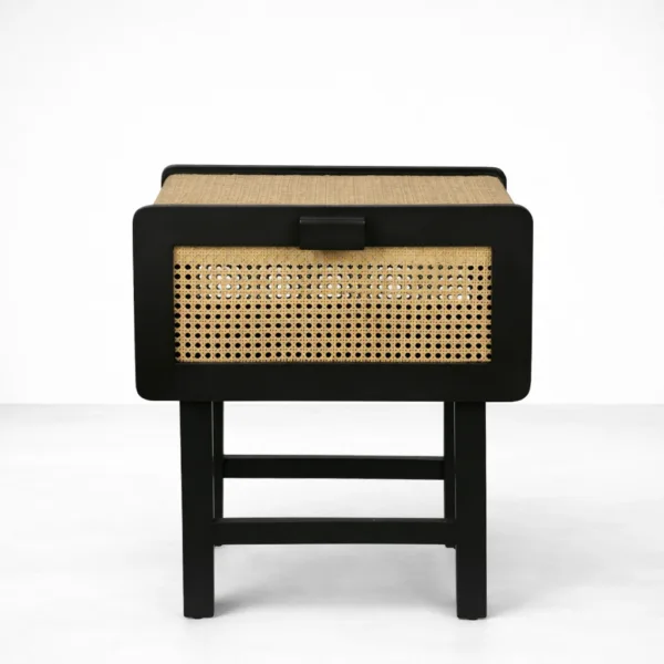 angled view of black teakwood cane bedside table
