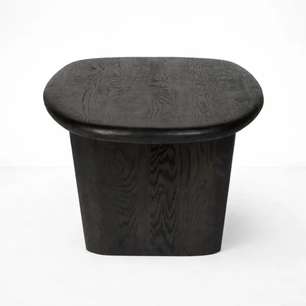 INTERIORZE teakwood oval coffee table with sculpted legs in black finish