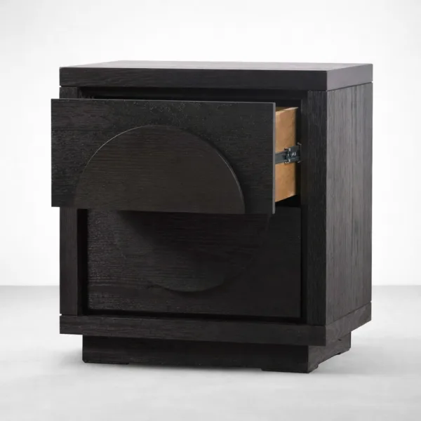 front open drawer view of black teakwood bedside table