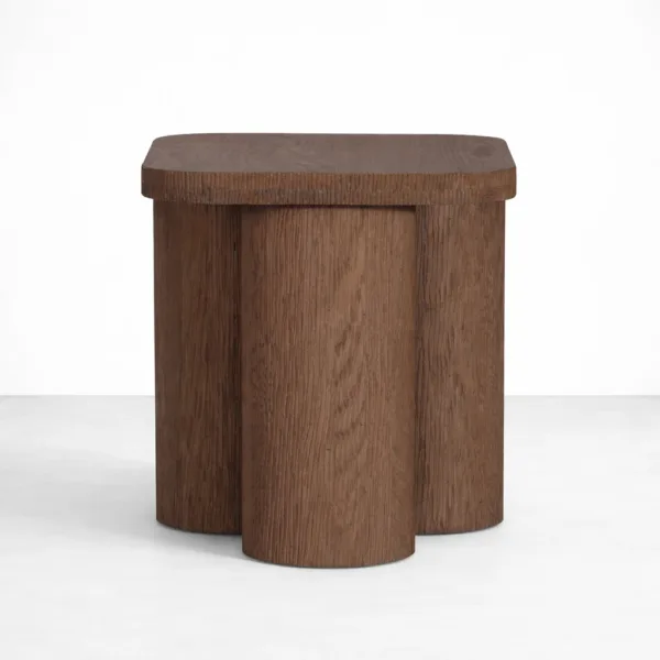 Handcrafted teakwood side table with rounded rectangular top and cylindrical base by INTERIORZE