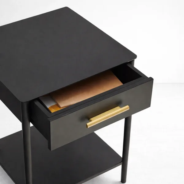 front elevation of black teakwood bedside table with brass handle