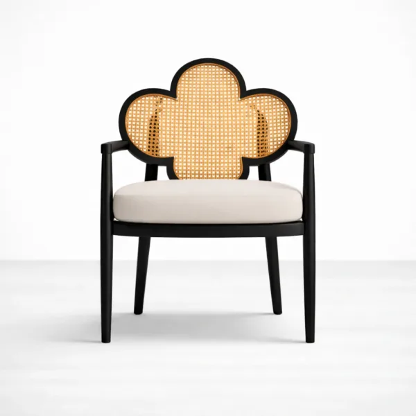 Front view of teakwood cane back arm chair with beige upholstered seat and black polish