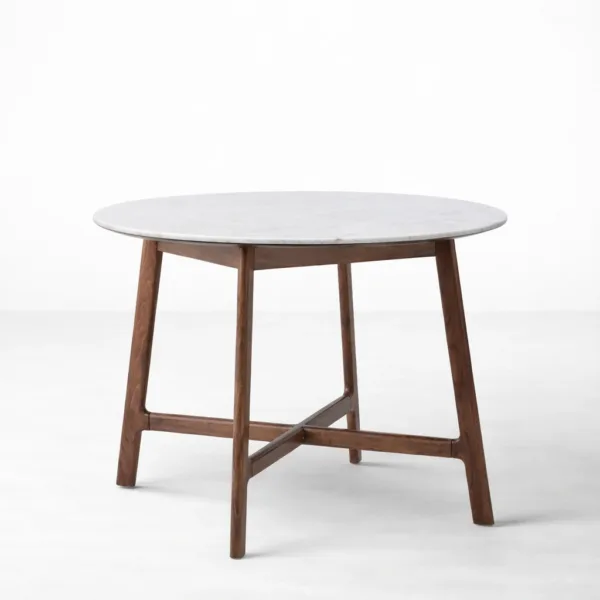 Angled view of marble top on INTERIORZE Siena round dining table