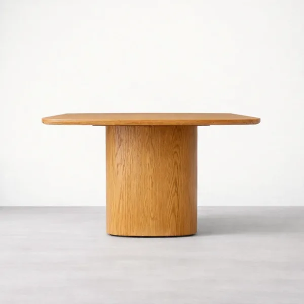 End view of INTERIORZE Arvello teakwood pedestal dining table