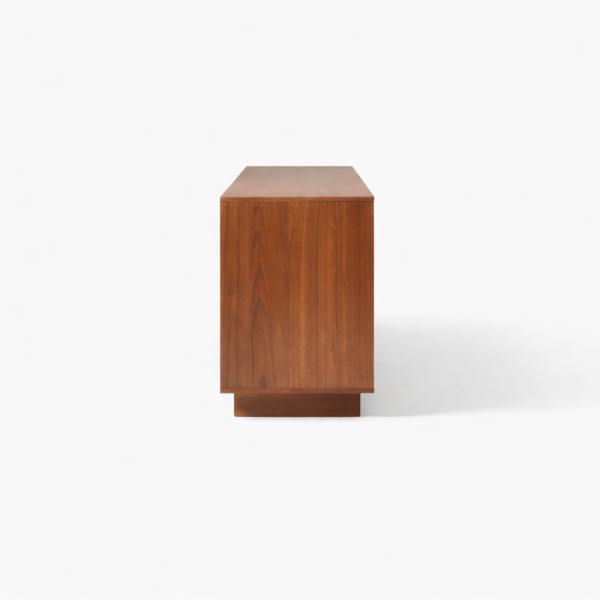 Side view of the Lowline Plinth teak wood media console by INTERIORZE