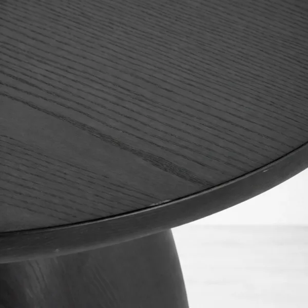 Pebble Pedestal teak wood side table by INTERIORZE with round top and sculptural pedestal base